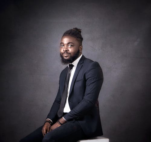 有关上班服, 坐, 工作室拍摄的免费素材图片