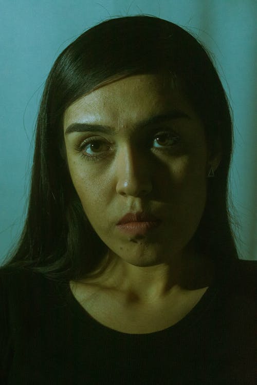 有关人, 严肃, 垂直拍摄的免费素材图片