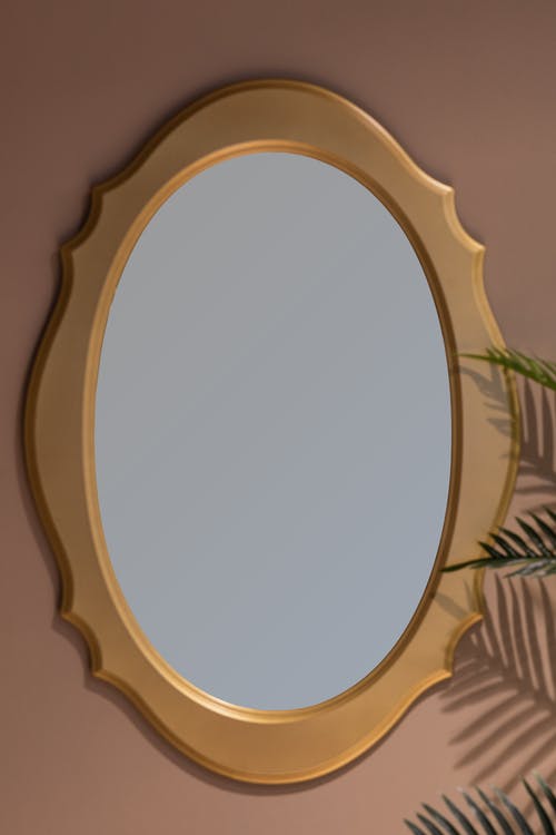 椭圆形棕色木框镜 · 免费素材图片