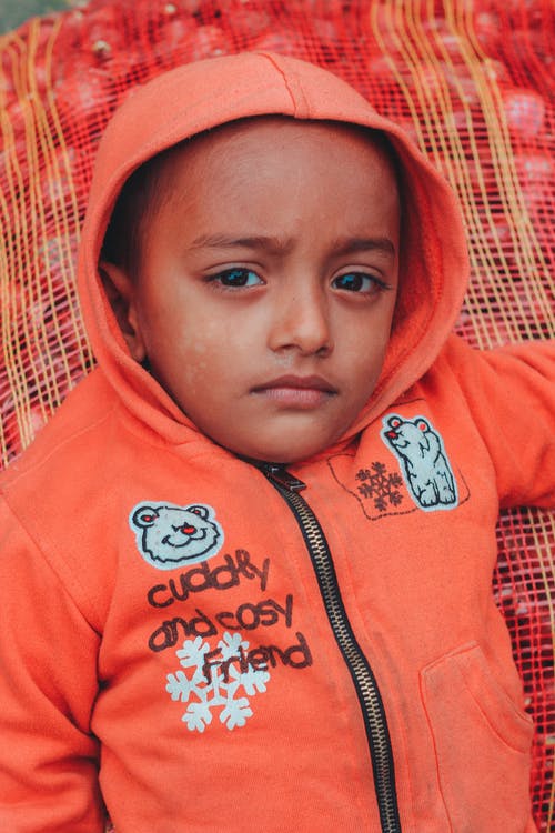 有关儿童, 垂直拍摄, 夹克的免费素材图片