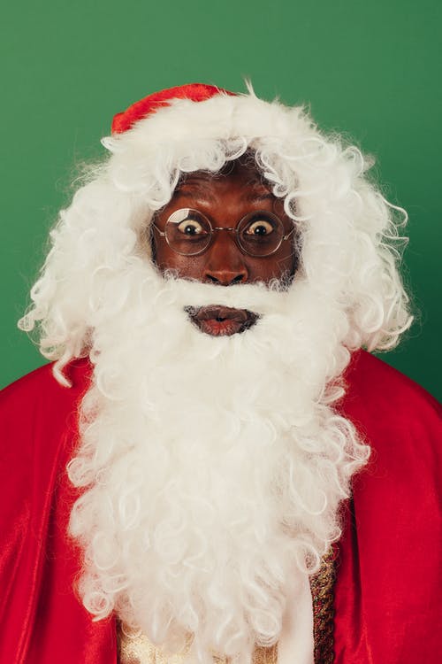 圣诞老人衣服的吃惊的人 · 免费素材图片