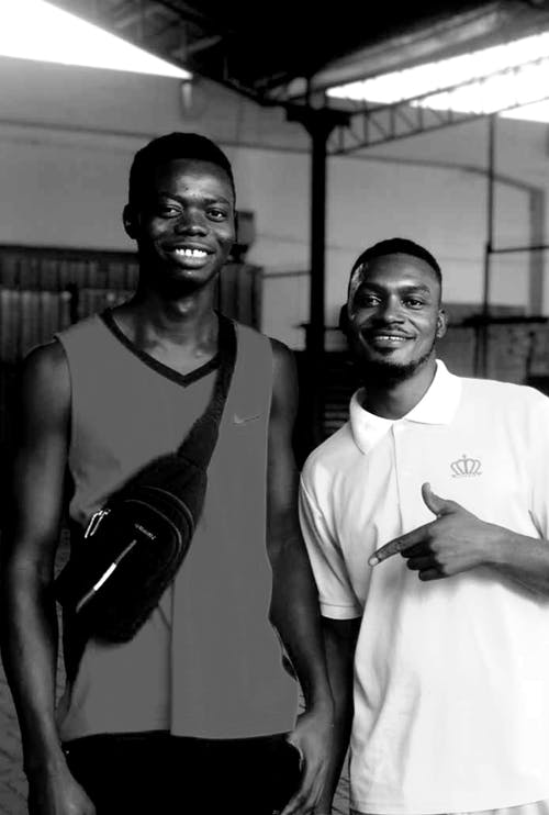 有关polo衫, 吊帶包, 垂直拍摄的免费素材图片