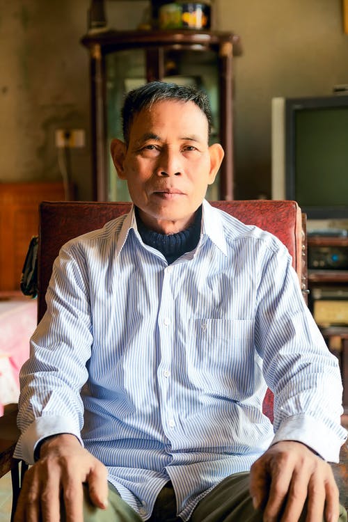 有关人, 坐, 垂直拍摄的免费素材图片