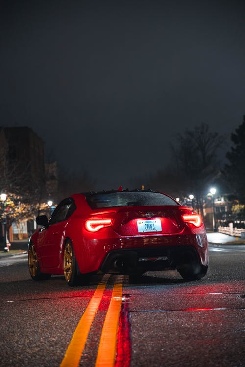 有关四门轿车, 垂直拍摄, 尾灯的免费素材图片