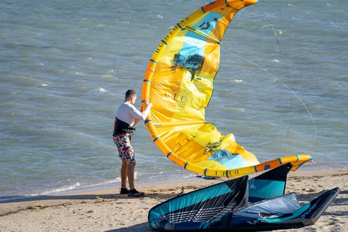 有关kiteboarder, 人, 侧面图的免费素材图片