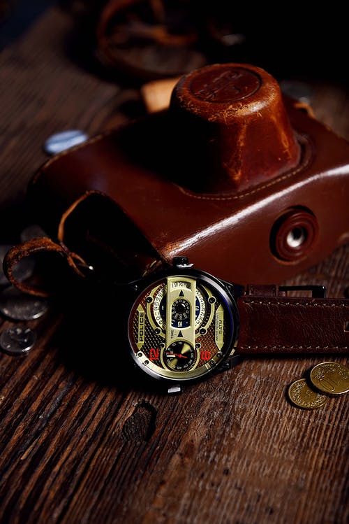 有关垂直拍摄, 工作室拍摄, 手表的免费素材图片