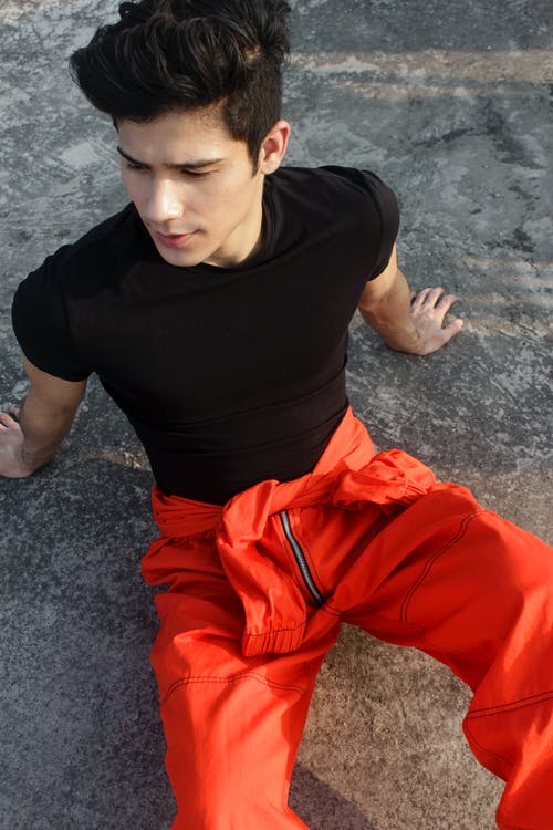 有关人, 垂直拍摄, 红裤子的免费素材图片