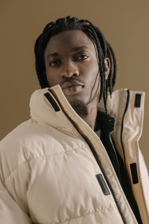 有关冬衣, 严肃, 外衣的免费素材图片