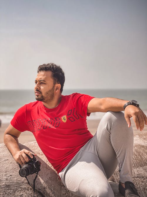 有关人, 坐, 垂直拍摄的免费素材图片