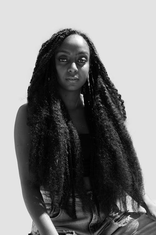 有关單色, 垂直拍摄, 捲髮的免费素材图片