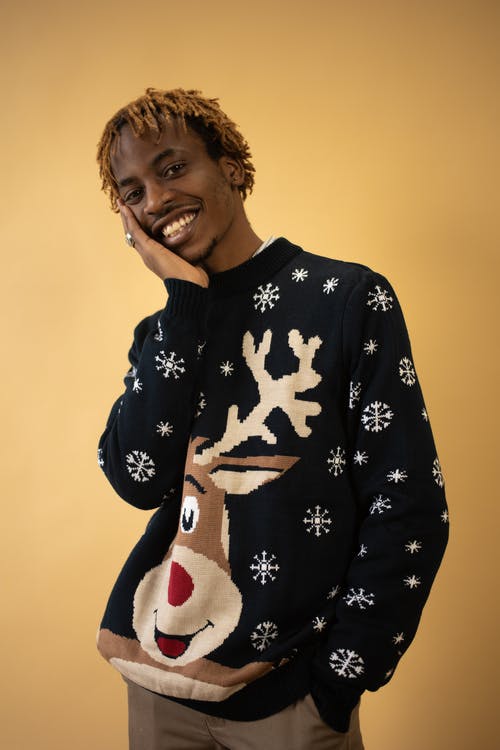 有关圣诞毛衣, 垂直拍摄, 微笑的免费素材图片
