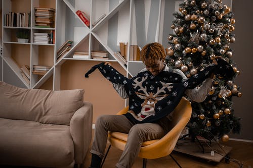 有关圣诞毛衣, 圣诞气氛, 坐的免费素材图片