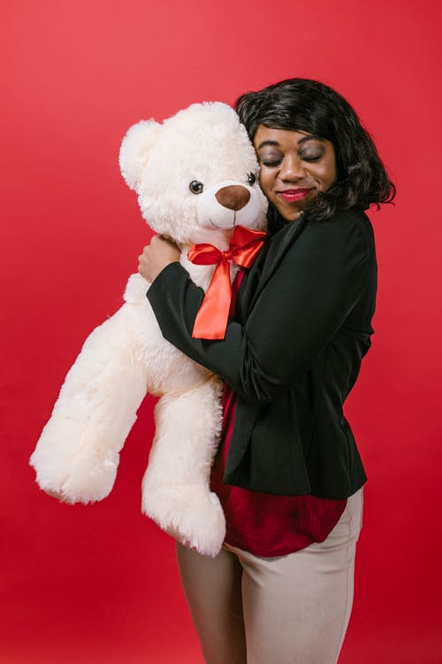 有关填充玩具, 女人, 幸福的免费素材图片