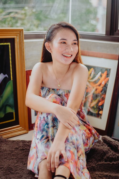 有关人, 坐, 垂直拍摄的免费素材图片