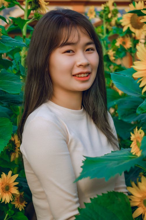 有关垂直拍摄, 女人, 微笑的免费素材图片