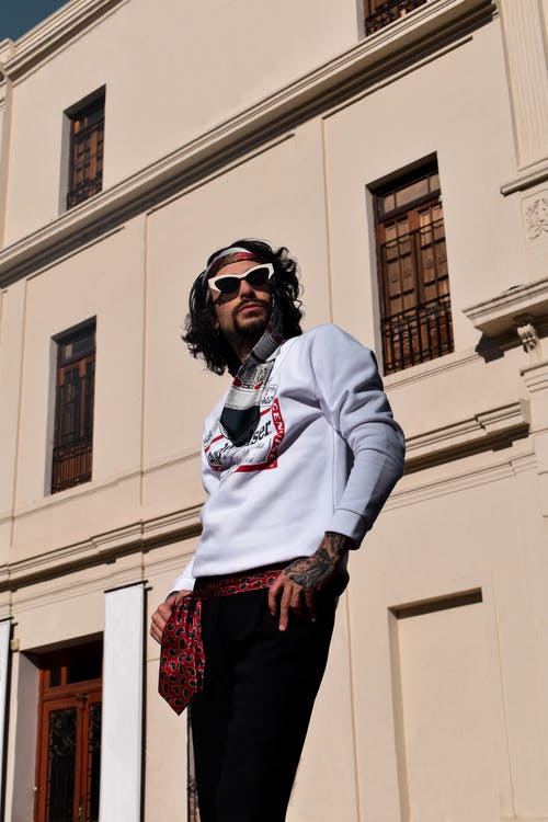 有关人, 垂直拍摄, 墨镜的免费素材图片