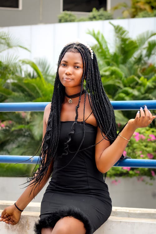 有关坐, 垂直拍摄, 女人的免费素材图片