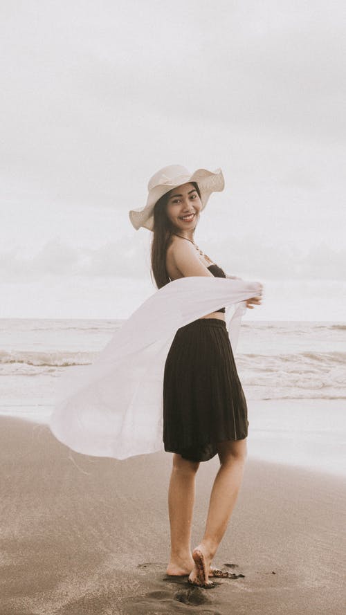 有关垂直拍摄, 女人, 岸边的免费素材图片