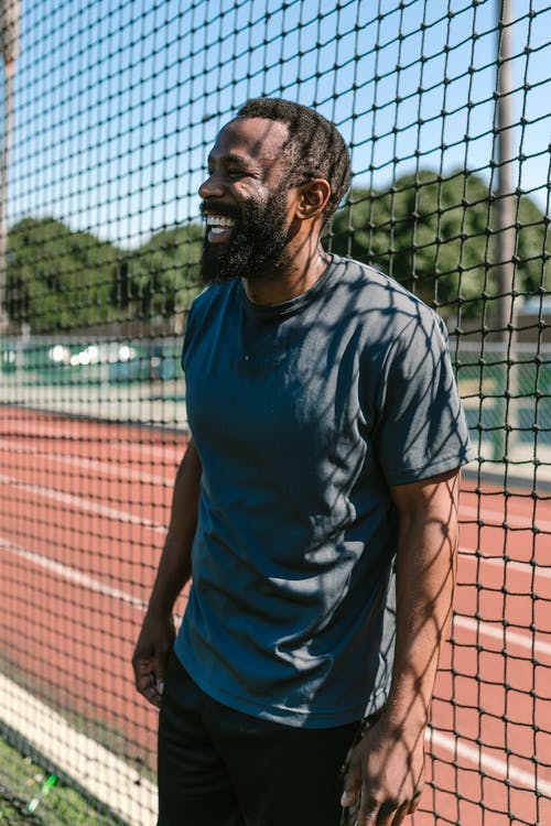 有关人, 围栏, 垂直拍摄的免费素材图片