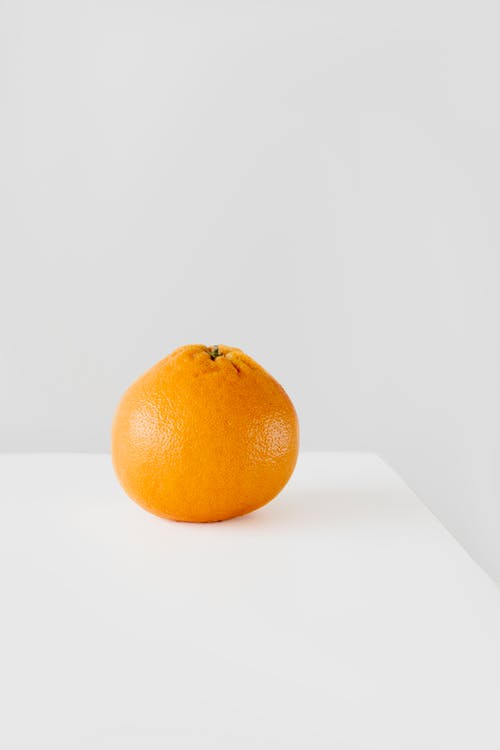 有关垂直拍摄, 工作室拍摄, 橙子的免费素材图片