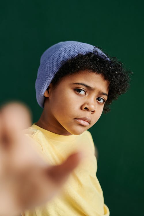 有关垂直拍摄, 帽子, 卷发的免费素材图片