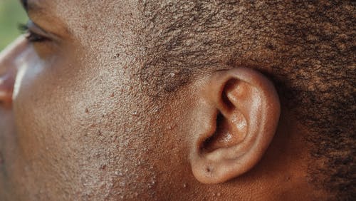 特写摄影中人的耳朵 · 免费素材图片