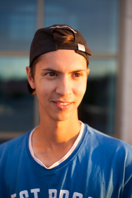 有关人, 垂直拍摄, 帽子的免费素材图片