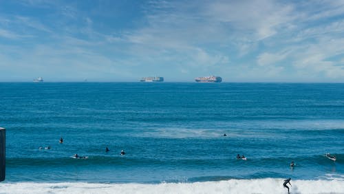 有关surfboarders, 休闲, 加州的免费素材图片