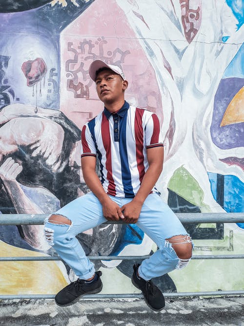 有关人, 坐, 垂直拍摄的免费素材图片