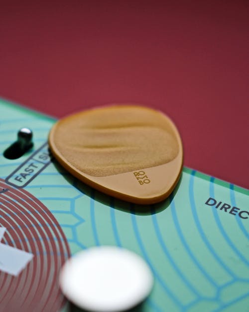 有关吉他拨片, 垂直拍摄, 拨子的免费素材图片