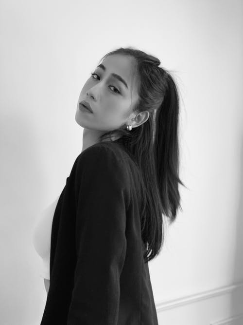 有关垂直拍摄, 年轻, 摆姿势的免费素材图片