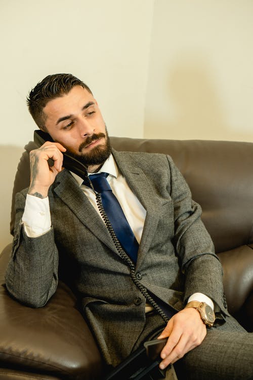 有关上班服, 坐, 垂直拍摄的免费素材图片