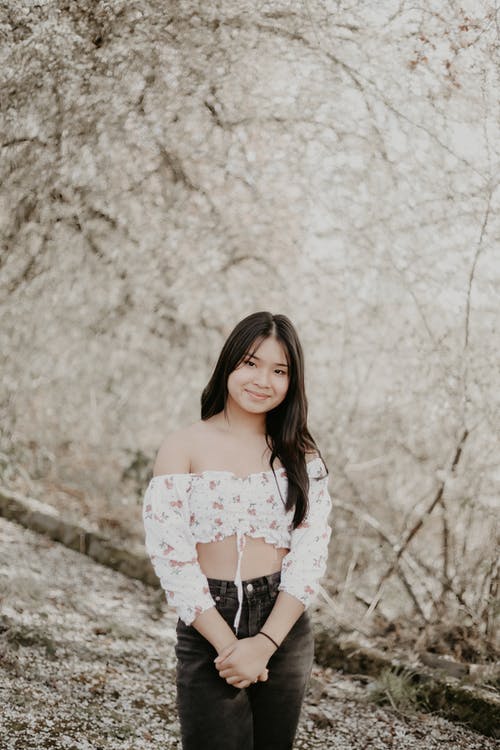 有关咖啡色头发的女人, 垂直拍摄, 女人的免费素材图片