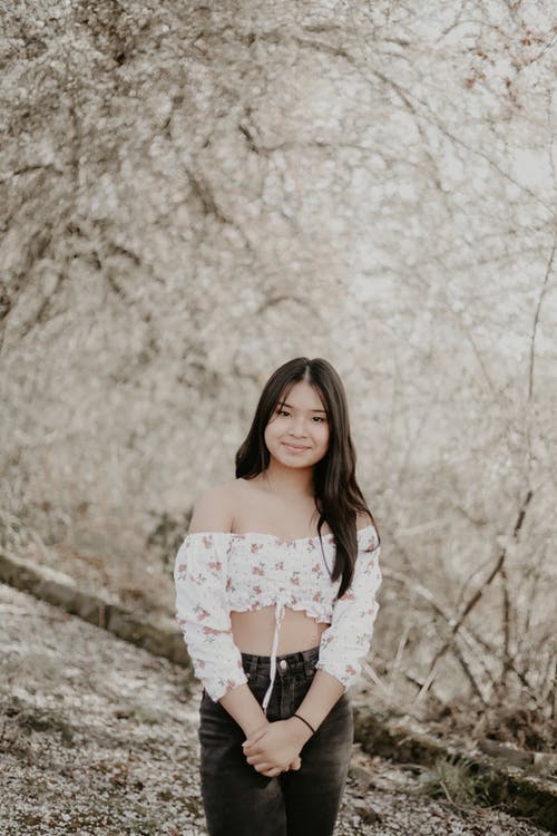 有关咖啡色头发的女人, 垂直拍摄, 女人的免费素材图片