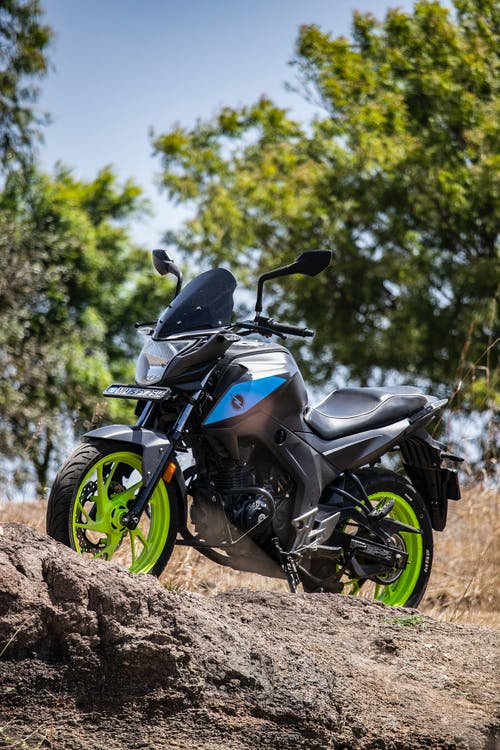 有关停, 垂直拍摄, 摩托车的免费素材图片