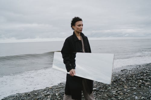 有关垂直拍摄, 女人, 岸边的免费素材图片