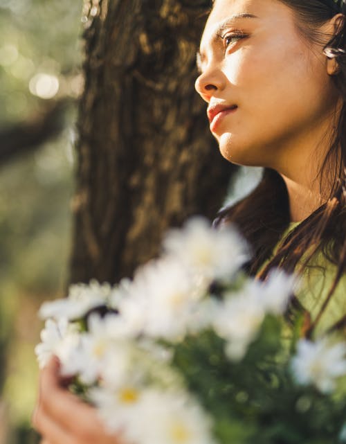有关一束鲜花, 垂直拍摄, 握住的免费素材图片