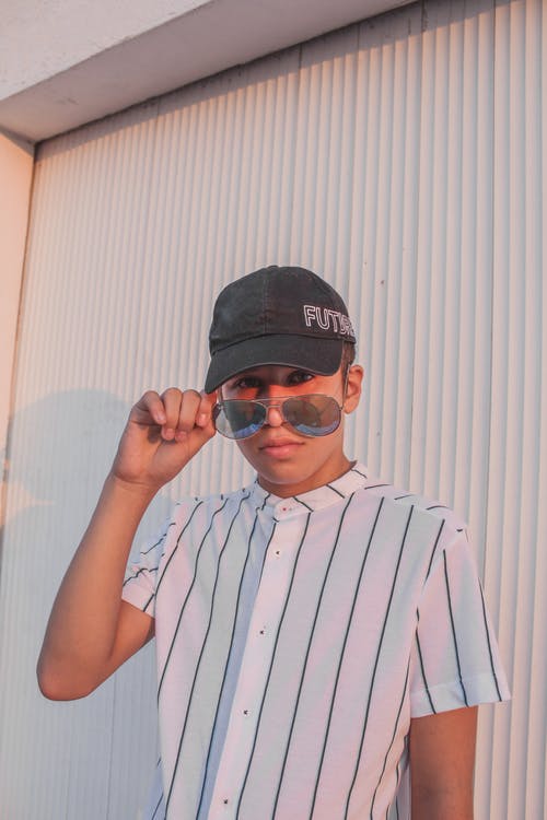 有关人, 垂直拍摄, 墨镜的免费素材图片