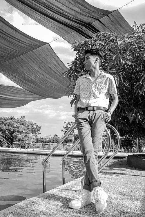 有关人, 倚, 双手插在口袋里的免费素材图片