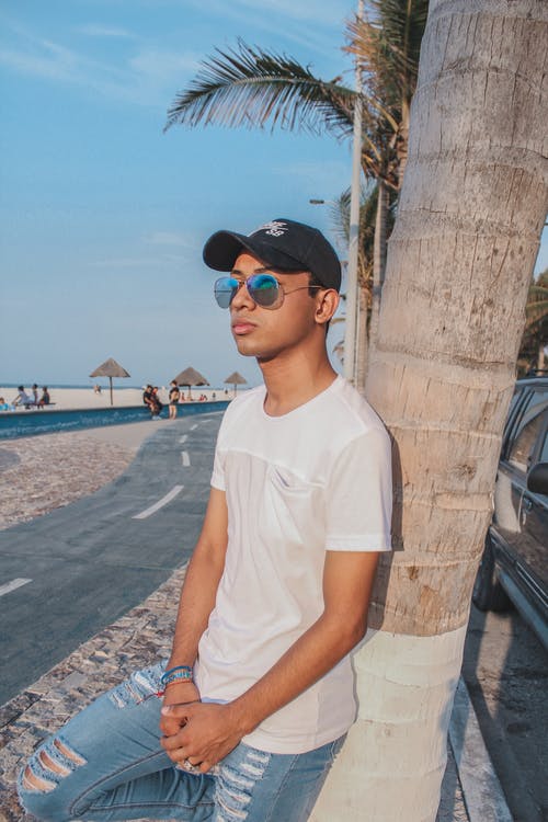 有关人, 倚, 垂直拍摄的免费素材图片