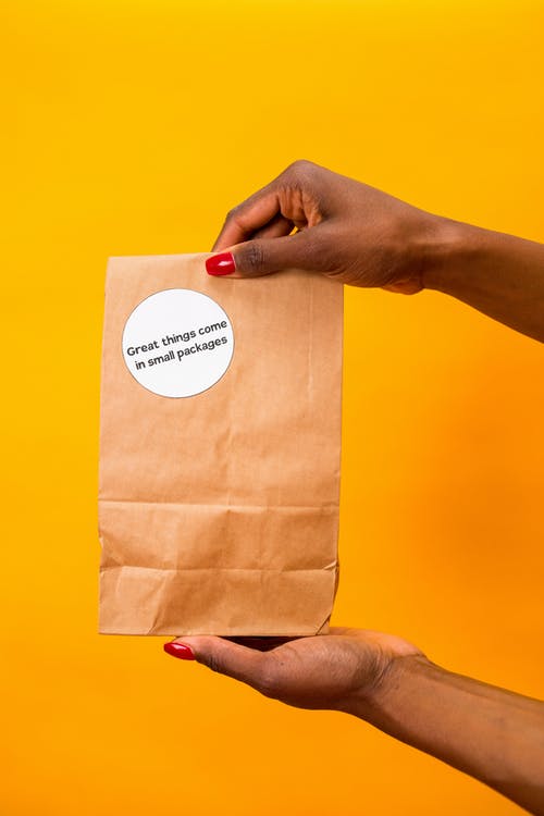 有关包装, 垂直拍摄, 手的免费素材图片