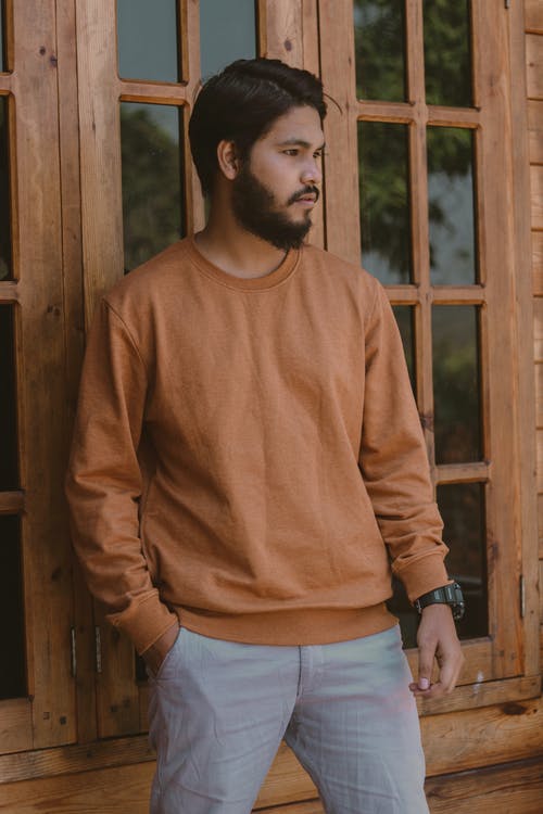 有关人, 垂直拍摄, 摆姿势的免费素材图片