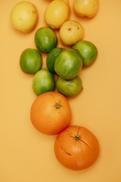 有关orange_background, 健康食品, 垂直拍摄的免费素材图片
