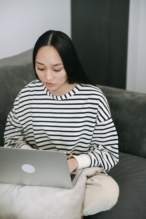 有关在家工作, 坐, 垂直拍摄的免费素材图片