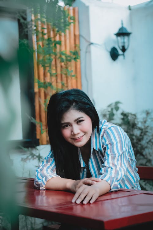 有关前景, 坐, 垂直拍摄的免费素材图片