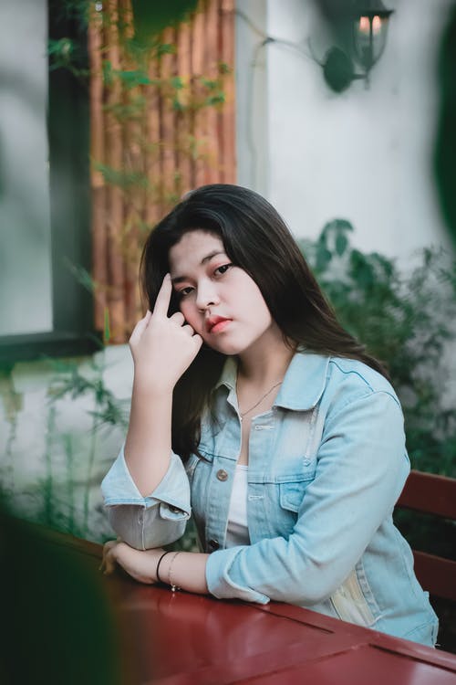 有关前景, 坐, 垂直拍摄的免费素材图片