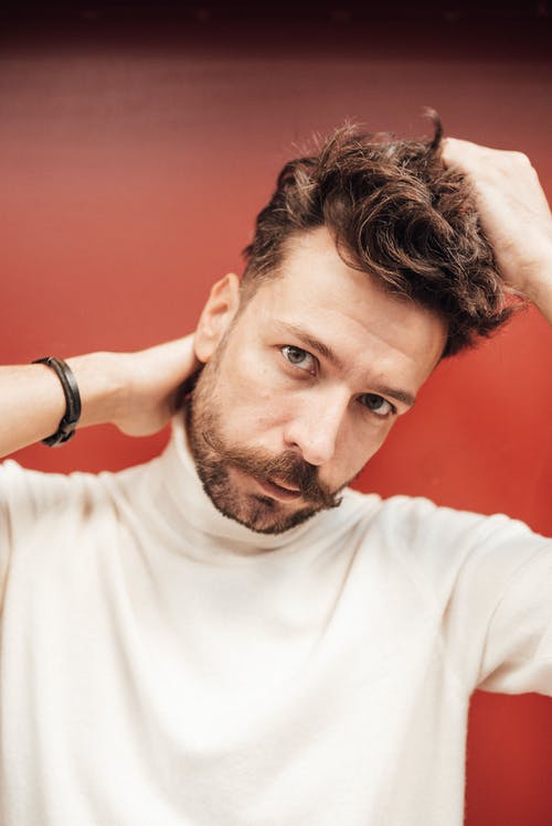 有关人, 垂直拍摄, 手在头后面的免费素材图片