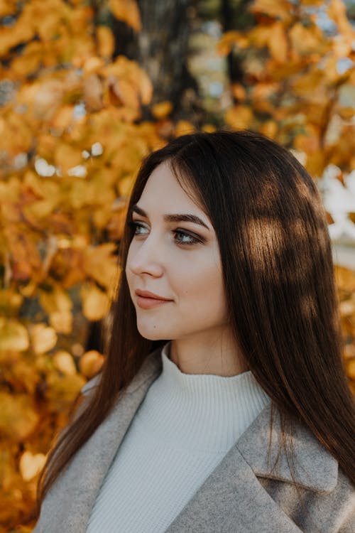 有关垂直拍摄, 大衣, 女人的免费素材图片