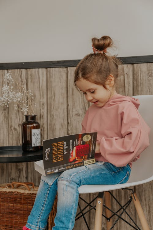 有关儿童, 坐, 垂直拍摄的免费素材图片