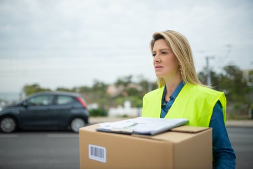 有关信使, 包裹, 女人的免费素材图片